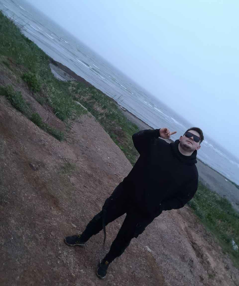 Николай
